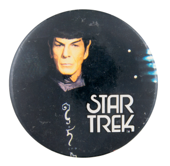 spock on a black background wearing his meditation robes. text says 'star trek'