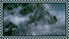 a stamp of Alan Lee's art of the pass of Caradhras, with a blue border.